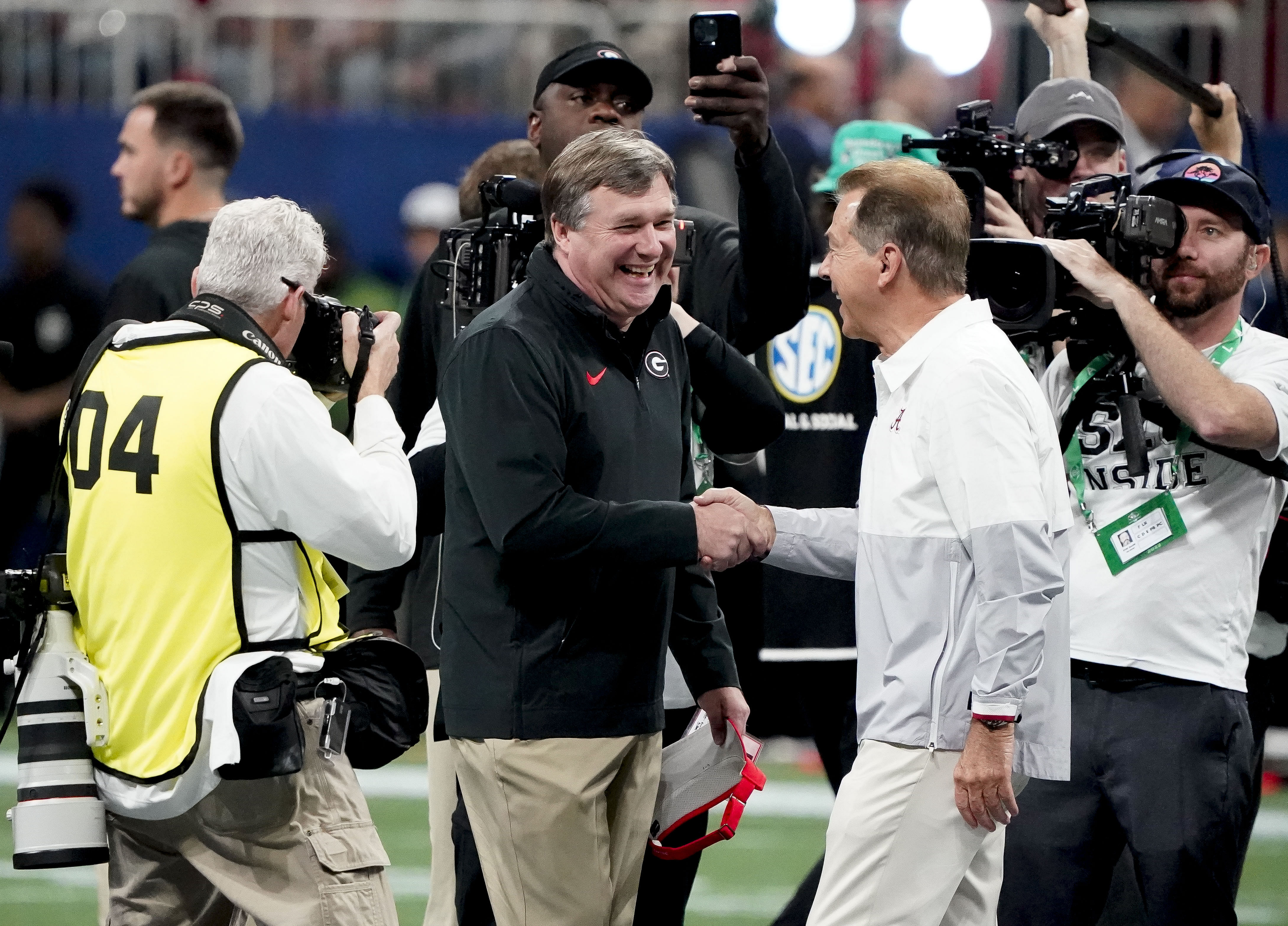 Georgia Bulldogs head coach Kirby Smart and former coach Nick Saban - Source: Imagn